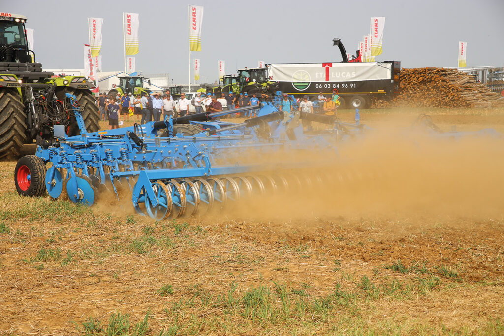Photo of a Lemken compact disc harrow being demonstrated at an event.