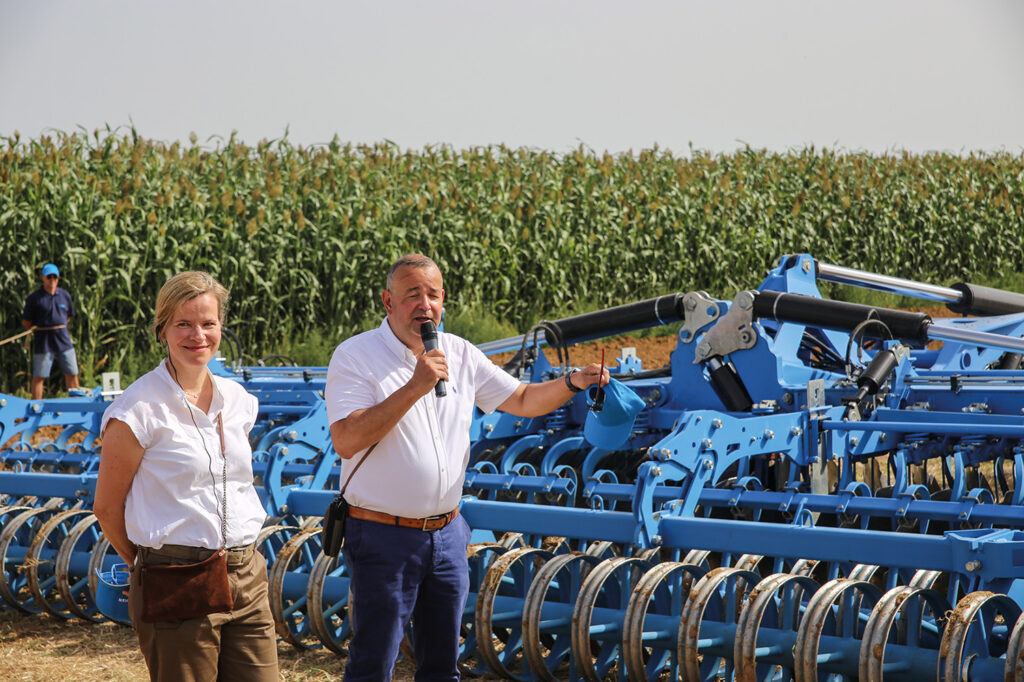 Nichola Lemken is pictured with Lemken CEO Anthony van der Ley with a Lemken compact disc harrow.