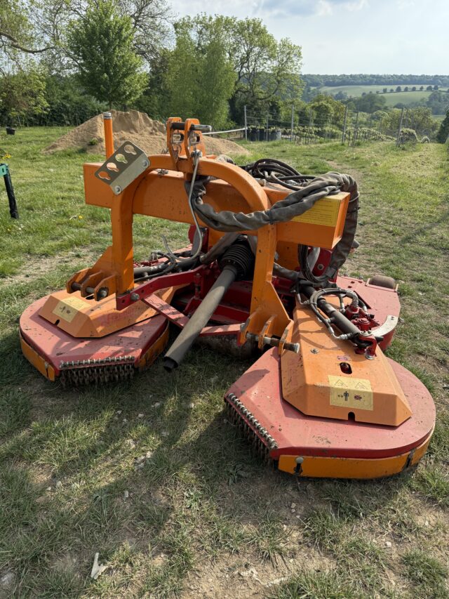A fisher front mounted mower for sale.