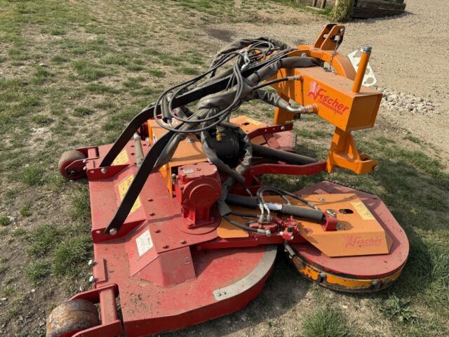 A fisher front mounted mower for sale.