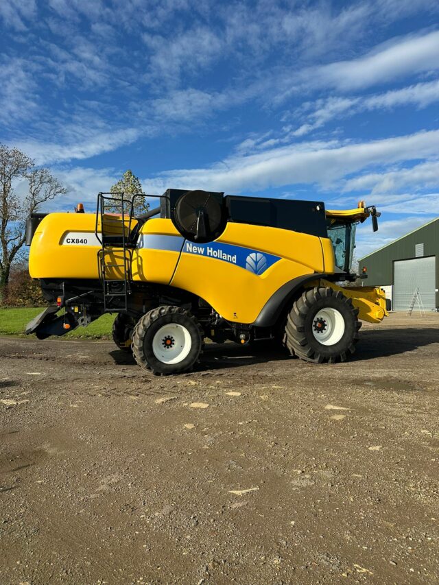 One- 2005 New Holland CX840 Combine