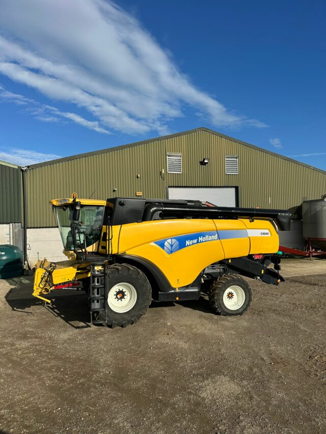 One- 2005 New Holland CX840 Combine