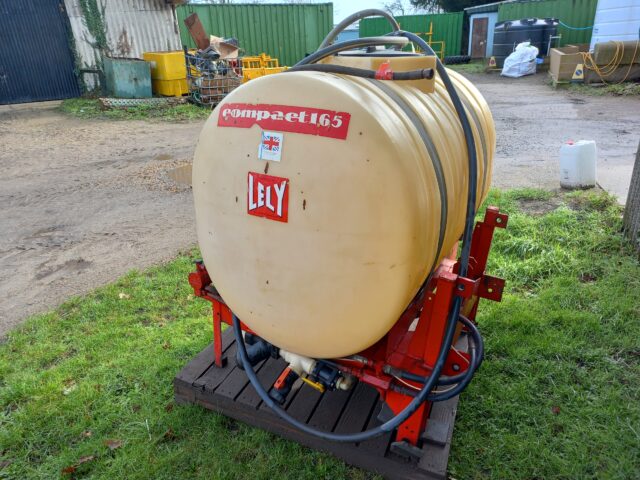 Front linkage mounted sprayer tank