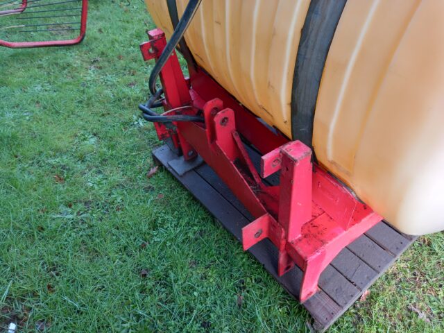 Front linkage mounted sprayer tank